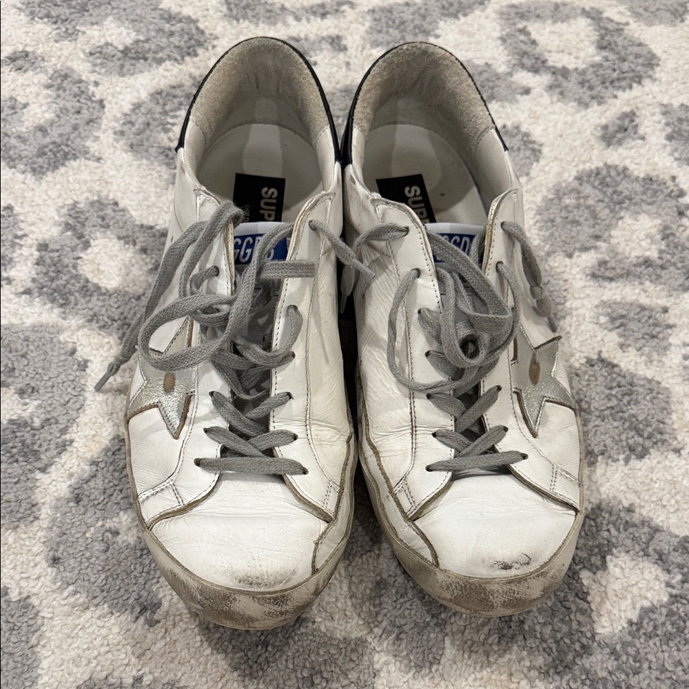 Golden Goose Super-Star low-top sneakers in white leather with a black heel tab